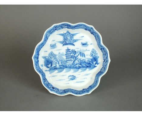 A Caughley teapot stand circa 1788-95 of hexagonal form, painted in blue with the 'Tower' pattern, unglazed base unmarked, 15