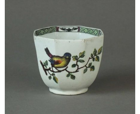 A Worcester octagonal coffee cup circa 1756 applied with a double scroll handle, transfer-printed with a finch on a branch an