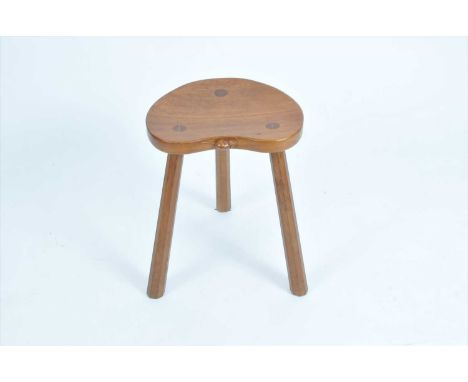 Robert 'Mouseman' Thompson, an oak cow stool, the kidney shaped seat with a carved mouse signature to the seat (middle border