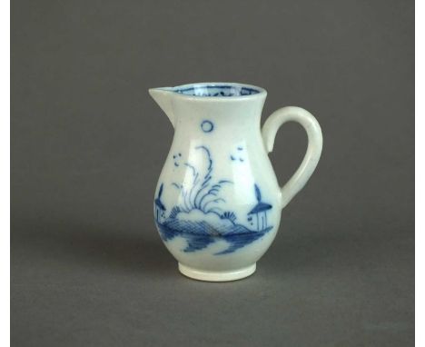 A Caughley toy sparrow beak jug circa 1785-90 painted in bright blue with the 'Island' pattern with internal border to interi