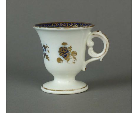 A rare Caughley egg or ice cup circa 1785-90 probably gilded by Chamberlain's Worcester, the bell form bowl raised on a sligh