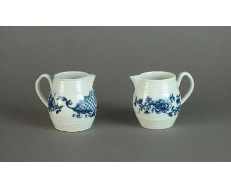 A Worcester cream jug circa 1760 of barrel form with sparrow beaks, transfer-printed in underglaze blue with flowers, hatched