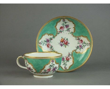 A Worcester teacup and saucer in Marchioness of Huntley-style circa 1770-72 decorated with spiralling festoons of flowers wit