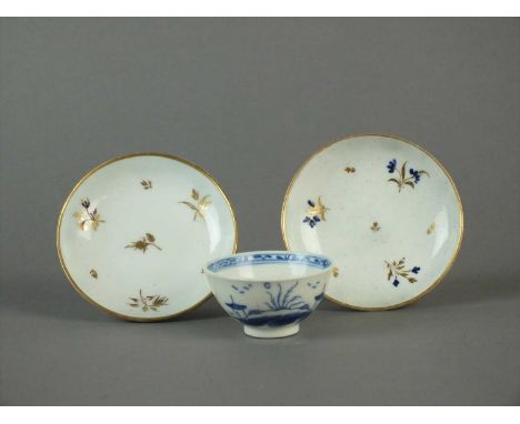 A Caughley toy tea bowl and two toy saucers circa 1785-95 the tea bowl painted in blue with the Island pattern and the saucer