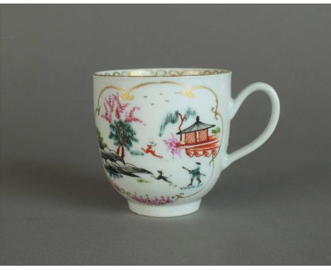 A Worcester coffee cup circa 1765-70 of plain form with indented loop handle, painted in bright enamels with the 'Stag Hunt' 