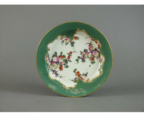 A Worcester stand for a butter tub circa 1770 circular, painted with sprays of spotted fruit including peaches, sliced apple 