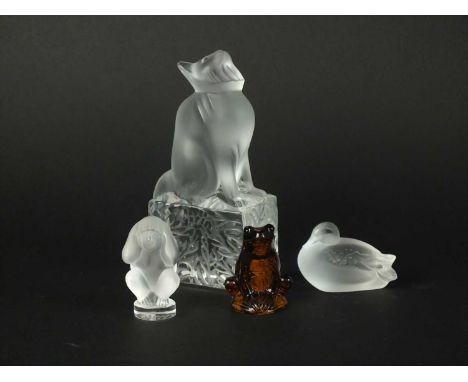 A group of four Lalique Crystal figures post-war including an amber frog, monkey, duck and a cat on pedestal glass base, each