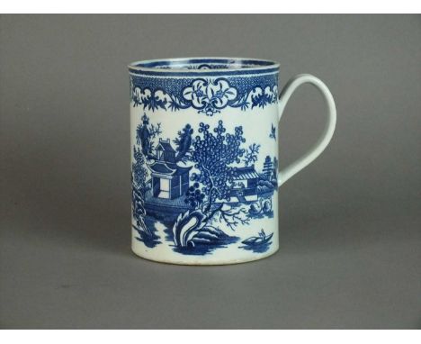 A large Worcester tankard circa 1775-85 of cylindrical shape with an indented loop handle, transfer-printed in underglaze blu