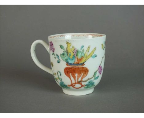 An unusual Worcester coffee cup circa 1765-68 of plain sharp, with grooved handle, painted in the Chinese style with a bowl o