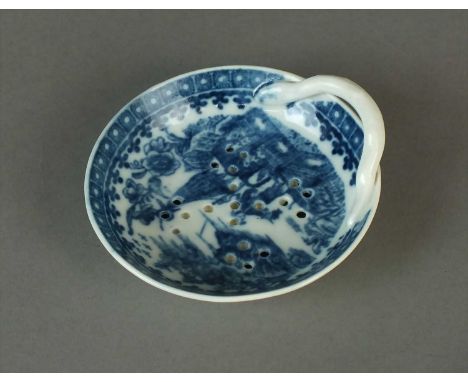 A Caughley egg drainer circa 1785 the circular, pierced bowl transfer-printed in underglaze blue with the Pleasure Boat patte