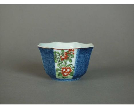 A Worcester teabowl, outside decorated circa 1762 of octagonal form, from the 'Red Line Bordered' group, painted with alterna