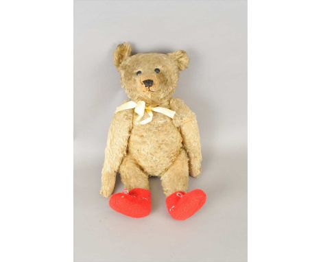 'Jim', a large early Steiff teddy bear, with golden coat, black button eyes, pronounced muzzle, black stitched nose, mouth an