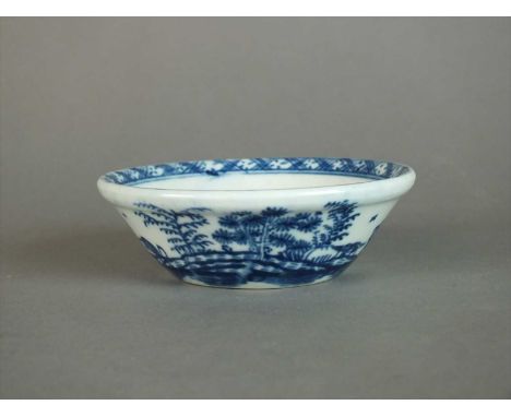 A Caughley tart or patty pan circa 1780 of circular form with slightly reinforced everted rim, painted in underglaze blue wit