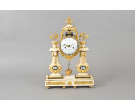 A 19th century white marble and ormolu cased portico type mantle clock, the drum cased movement with a white enamel dial, wit