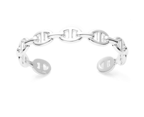 A CHAINE D'ANCRE ENCHAINEE BRACELET / BANGLE, HERMES in sterling silver, designed as a single row of anchor chain links, sign