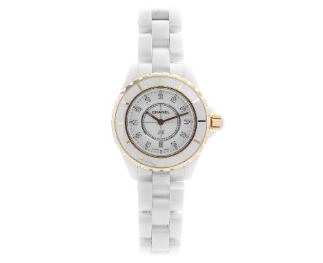 A J12 DIAMOND AND CERAMIC WRIST WATCH, CHANEL 38mm case, circular dial with gold batons and diamond jewelled numbers, on a wh