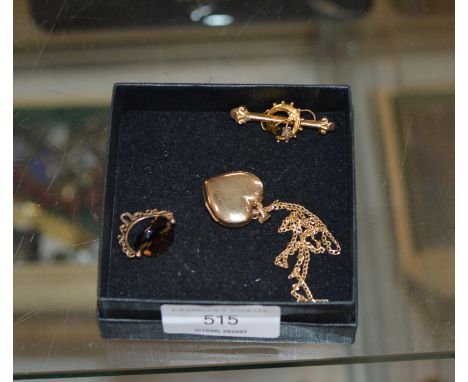 9 CARAT GOLD CHAIN WITH HEART SHAPED LOCKET, 9 CARAT GOLD BROOCH PIN, 9 CARAT GOLD REVOLVING FOB - APPROXIMATE COMBINED WEIGH