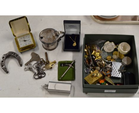 BOX CONTAINING GILT PENDANT ON CHAIN, VARIOUS BADGES, COSTUME JEWELLERY, CIGARETTE LIGHTER, SMALL HIP FLASK, KILT BROOCH, CLO