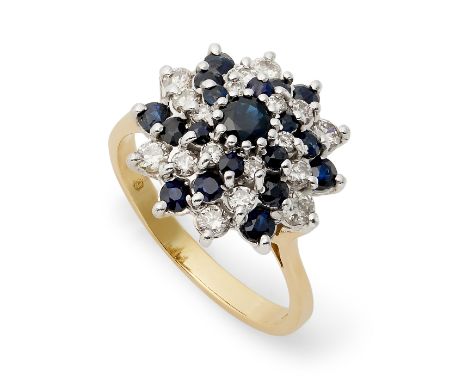 The cluster with a circular-shape sapphire and round brilliant-cut diamond twist design, ring size O.Weight approx. 6.07g Sha