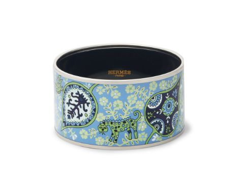 Designed with a floral pattern in shades of blue, green and white on a pale blue enamel background, with a silver-tone edge a