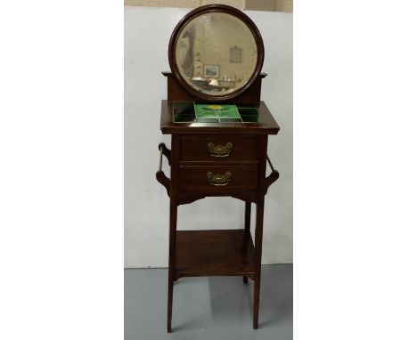 Art Deco walnut Gents Washstand, with an oval pivoting mirror over 2 drawers, brass towel rails on either side, tapered legs,