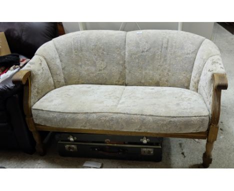 Two seater sofa in an oak frame, beige fabric