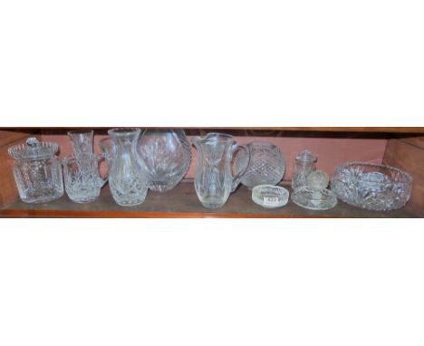 Group of Cut Glass – jugs, biscuit barrel, ashtrays, vases (some Waterford) (shelf)