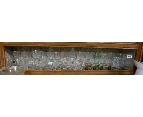 Shelf of glassware – wine glasses, dessert dishes etc