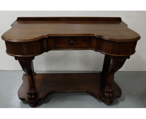 Victorian Mahogany Hall Table, with a serpentine shaped top and an apron drawer, supported on two cabriole legs with paw feet