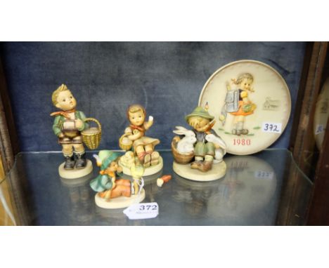 4 Geobel Hummel Figures – boys with baskets and birds and figure of girl (broken arm) & Goebel 1980 plate (5)