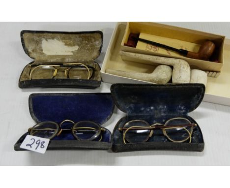 3 x part gold rimmed spectacles in cases, 3 clay pipes & a Peterson pipe (7)