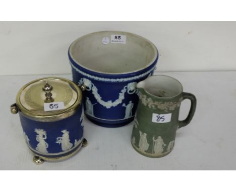 Blue and white Wedgewood Jasperware Jardinere and a similar biscuit jar, a green Wedgwood (3)