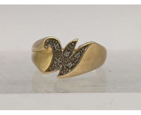 An 18ct gold ring in the form of the letter M set with diamonds, total weight 4.6gLocation: 