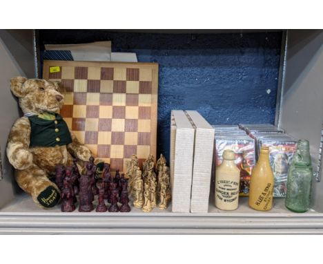 A composition chess set with board, a Harrods teddy and a set of Doctor Who CDs, Location 