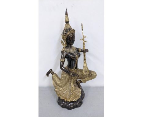 A patinated bonze Thai deity figure playing an instrument, 40h, Location: 