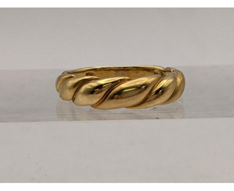 An 18ct gold twist style ring, total weight 3.2gLocation: 
