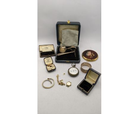 A silver pusher and spoon and napkin ring, a compact, a gold plated watch, a stopwatch, tiger eye earring and jewellery boxes