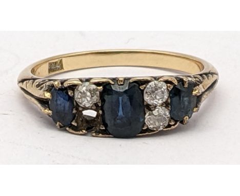 A yellow metal sapphire and diamond ring 2.9gLocation: 