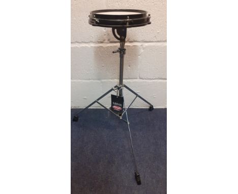 A Stagg practice/training drum on folding and adjustable stand, new with original tags. Location:RWM 