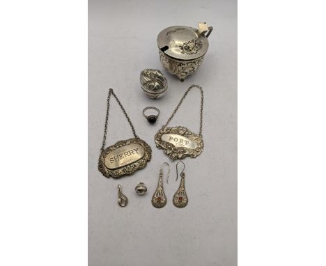 Mixed silver to include a silver embossed mustard pot, a silver ring, a silver Cambodian figural bird and other items, total 