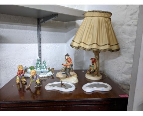 Three Goebel figures and three Goebel icy lakes, one icy adventure, a lamp and a clock tower A/fLocation A2B 