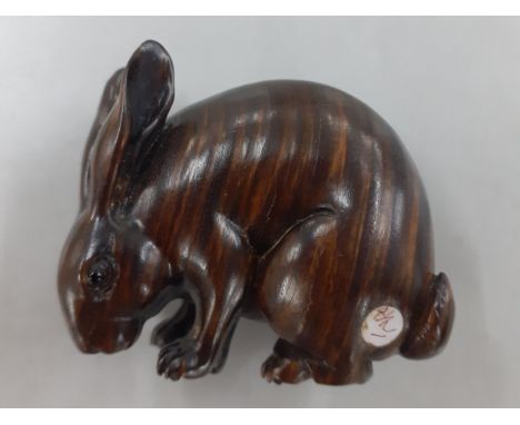 A Japanese treen netsuke in the form of a hare, Location: CAB 