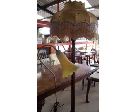20th C mahogany stained standard lamp with fluted column, and a brass floor standing reading lamp with galley type shade
