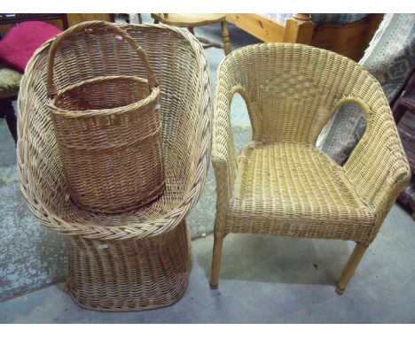 Wicker work armchair, another wicker chair, and a wicker step basket (3) 
