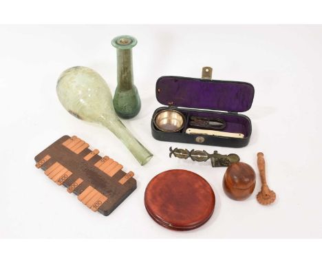 Assorted works of art including two antique glass vessels, sovereign scales and other items
