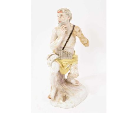 Furstenberg figure of a man with a pipe, circa 1780, shown seated on a tree stump, partially clothed, faint mark to base, 24c