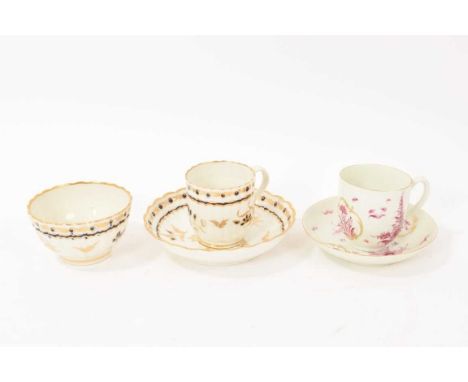An 18th century Worcester fluted trio, decorated with a foliate pattern in cobalt blue and gilt, with crescent marks, togethe