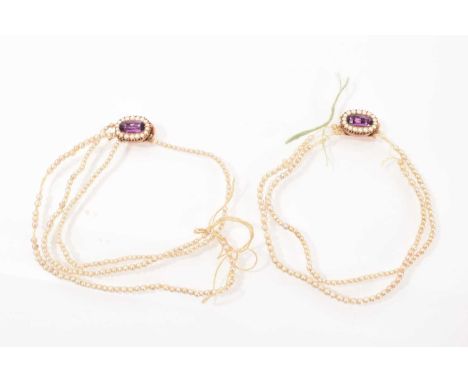 Pair of Georgian amethyst and seed pearl clasps on a string of simulated seed pearls, each cluster with a foil-backed amethys
