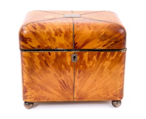 Regency blond tortoiseshell tea caddy, of cushion form with twin lidded compartments on silvered bun feet, 16cm wide