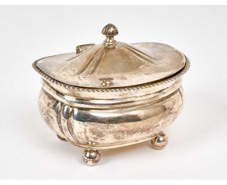 1930s silver tea caddy of bombé form, with gadrooned border and hinged domed cover, on four ball feet (Sheffield 1934) Robert